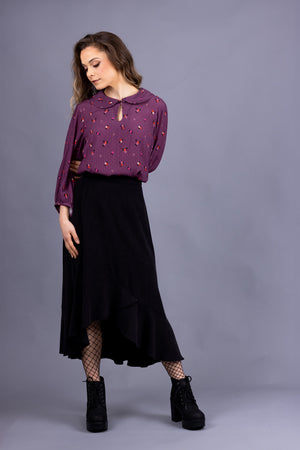 Helmi Peter Pan collar blouse in magenta viscose, front view, full length view, with Rosalie skirt in black