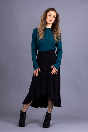 Rosalie darted midi skirt in black tencel twill, with turquoise rib knit top, front view