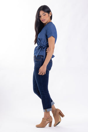 Forget-Me-Not Adeline wrap shirt pattern: side full length view of short sleeve blue dot shirt on model
