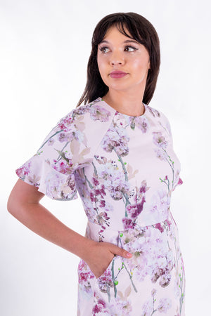 Forget-Me-Not Valerie short sleeve dress pattern in floral print, cropped three-quarters shot highlighting pocket feature
