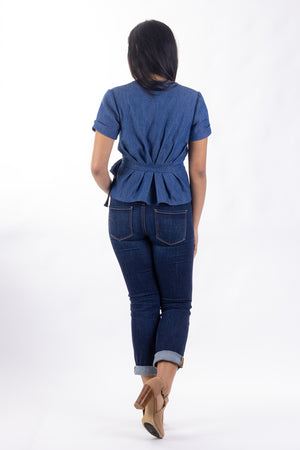 Forget-Me-Not Adeline wrap shirt pattern: rear full length view of short sleeve blue dot shirt on model