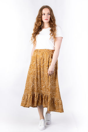 Forget-Me-Not Ella long skirt pattern in mustard, full-length front shot of model