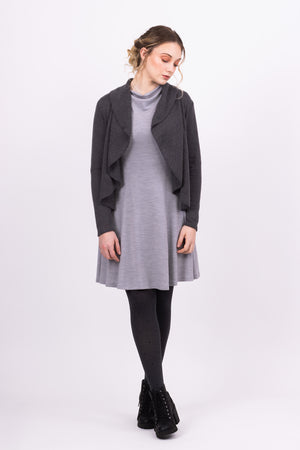 Short Kirsi cardigan in grey, worn open, with grey Clementine dress with cowl, front view