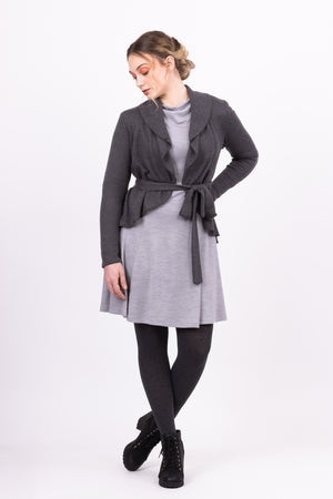 Short Kirsi cardigan in grey, worn partly closed, with grey Clementine dress, front view