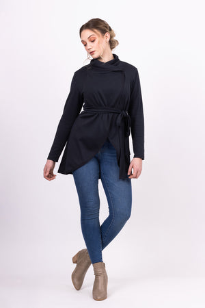 Long Kirsi cardigan in navy, worn closed, with blue jeans, front view