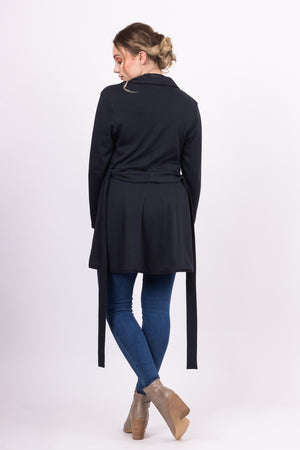 Long Kirsi cardigan in navy, worn open, with blue jeans, back view