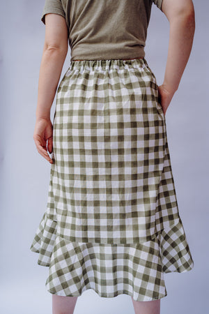 The Rosalie midi skirt in green cotton gingham, showing back view