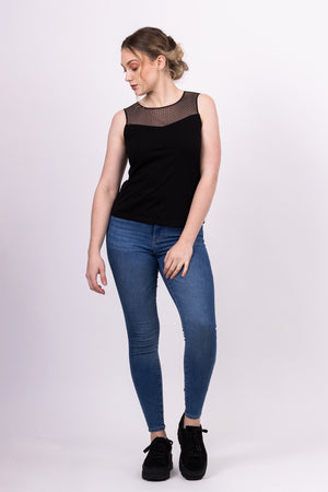 Sylvie knit top with black mesh contrast yoke, worn with blue jeans, front view