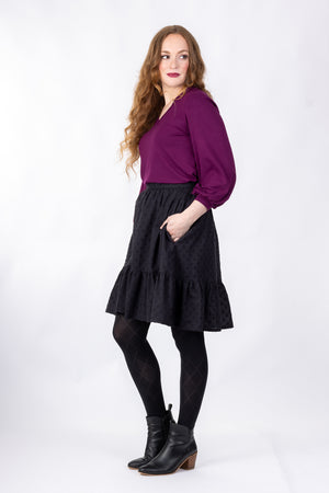 Forget-Me-Not Ella short skirt pattern in black, full-length side shot of model