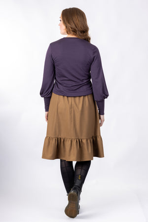 Forget-Me-Not Ella knee length skirt pattern in brown, full-length rear shot of model
