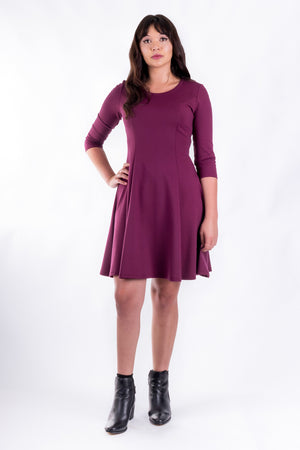 Forget-Me-Not Clementine three-quarter sleeved dress pattern, full length front view, in magenta.