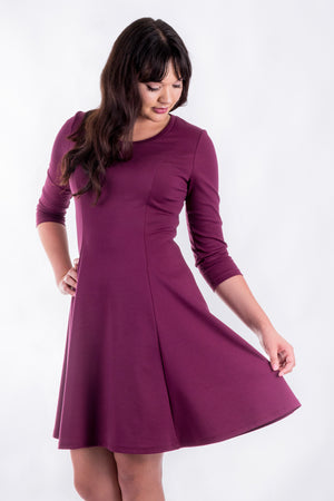 Forget-Me-Not Clementine three-quarter sleeved dress pattern, cropped length front view, in magenta.